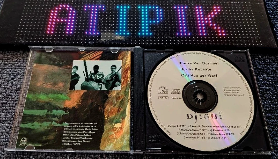 🎶 Djiguï - CD World Jazz Fusion Rare Bélgica - Kouyaté Van Dormael 🎸 – photo 3